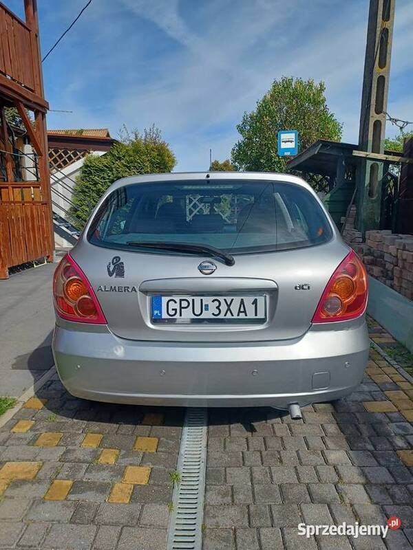 Srebrny Używany 2004 Nissan Almera Hatchback | 8900 zł - Obraz 1/4