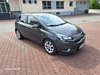 Szary Używany 2015 Opel Corsa Cosmo Hatchback | 22 900 zł (Uczciwa cena) - Obraz 1/4