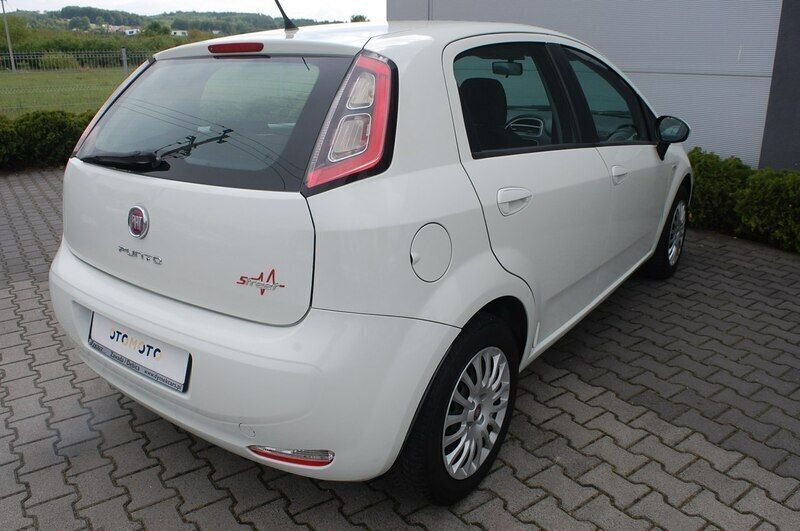 Używany Fiat Grande Punto 75 KM (55 kW) 2014 Biały Hatchback