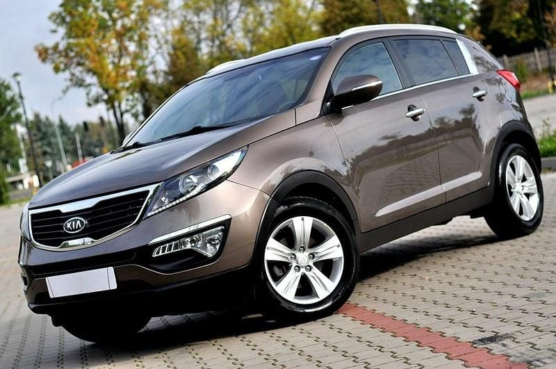 Brązowy (metalik, perła) Używany 2012 Kia Sportage 2 SUV | 35 900 zł (Uczciwa cena) - Obraz 1/4