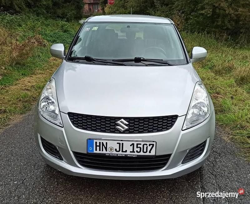 Srebrny Używany 2011 Suzuki Swift Hatchback | 23 300 zł (Uczciwa cena) - Obraz 1/4