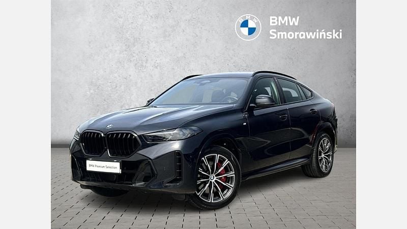 Czarny carbon m metalizowany Używany 2024 BMW X6 Comfort Edition SUV | 374 900 zł (Drogi) - Obraz 1/3