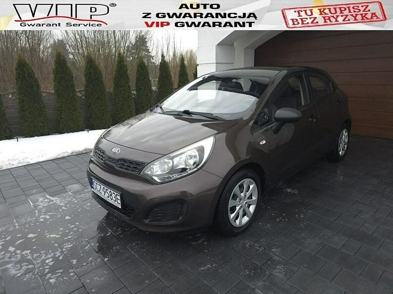 Brązowobeżowy Używany 2013 Kia Rio Hatchback | 24 500 zł (Uczciwa cena) - Obraz 1/4