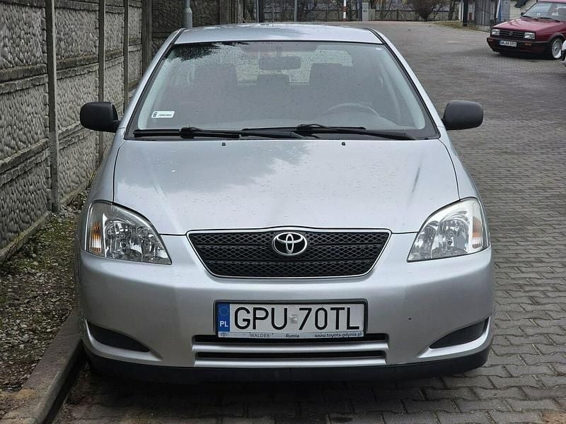 Używany Toyota Corolla 110 KM (80 kW) 2002 Srebrny (metalik) Hatchback