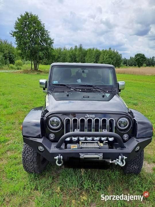 Czarny Używany 2014 Jeep Wrangler Sahara SUV | 89 000 zł (Super Cena) - Obraz 1/4