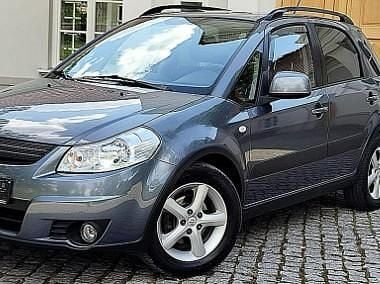 Szary (metalik) Używany 2009 Suzuki SX4 Minivan | 13 900 zł (Dobra cena) - Obraz 1/4