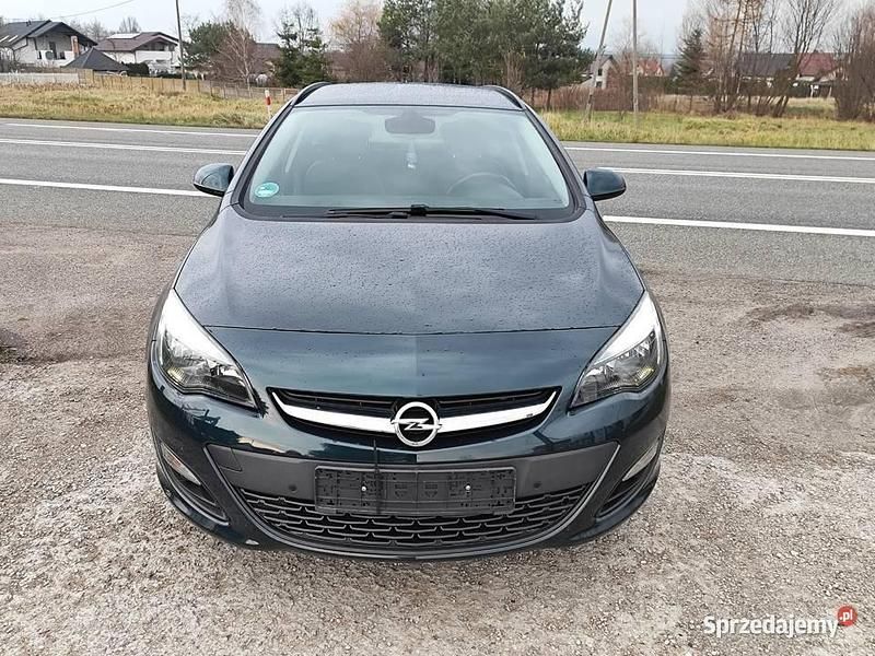 Zielony Używany 2015 Opel Astra Kombi | 23 900 zł (Super Cena) - Obraz 1/4