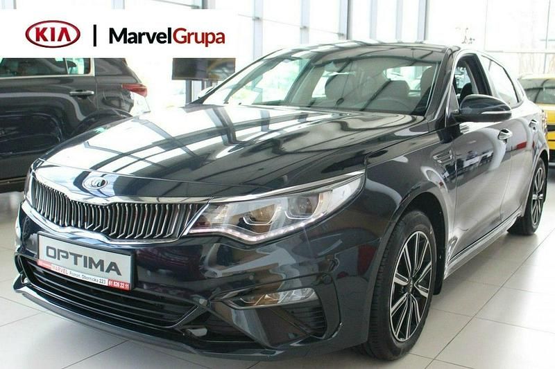 Niebieski ciemny Używany 2018 Kia Optima Coupe | 112 900 zł - Obraz 1/1
