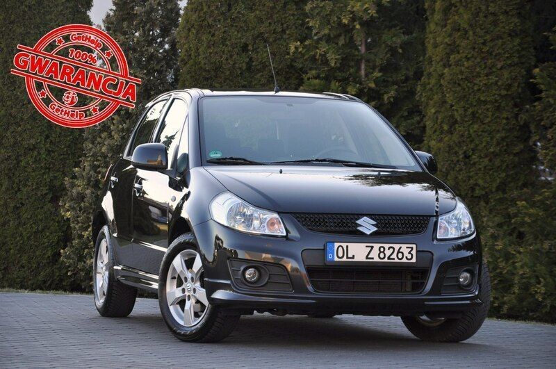 Czarny Używany 2012 Suzuki SX4 SUV | 26 900 zł (Uczciwa cena) - Obraz 1/4