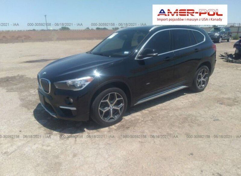 Czarny Używany 2017 BMW X1 SUV | 85 000 zł - Obraz 1/4