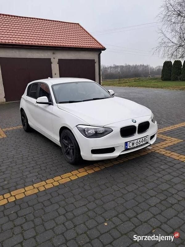 Biały Używany 2014 BMW 114 Hatchback | 23 900 zł - Obraz 1/4