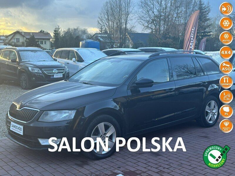 Czarny (metalik) Używany 2016 Skoda Octavia Kombi | 27 500 zł - Obraz 1/4