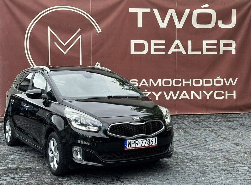 Czarny Używany 2014 Kia Carens 2 Minivan | 41 800 zł (Uczciwa cena) - Obraz 1/4