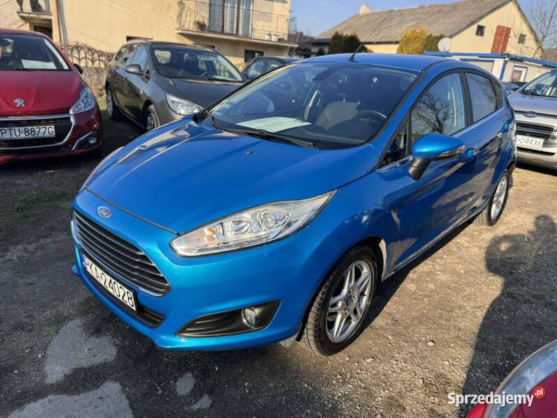 Niebieski (metalik) Używany 2013 Ford Fiesta Hatchback | 21 900 zł (Dobra cena) - Obraz 1/4