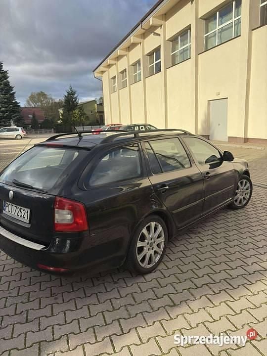 Czarny Używany 2009 Skoda Octavia Kombi | 12 800 zł (Dobra cena) - Obraz 1/4