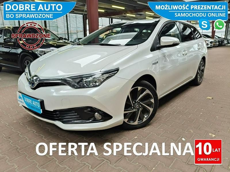 Biały Używany 2015 Toyota Auris Hybrid Kombi | 48 800 zł (Uczciwa cena) - Obraz 1/3