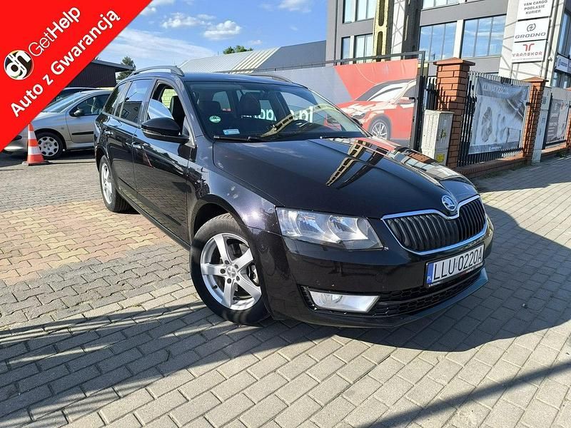 Czarny Używany 2016 Skoda Octavia Kombi | 44 800 zł (Dość drogi) - Obraz 1/4