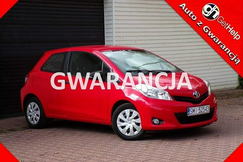 Czerwony Używany 2014 Toyota Yaris Hatchback | 24 790 zł (Uczciwa cena) - Obraz 1/4