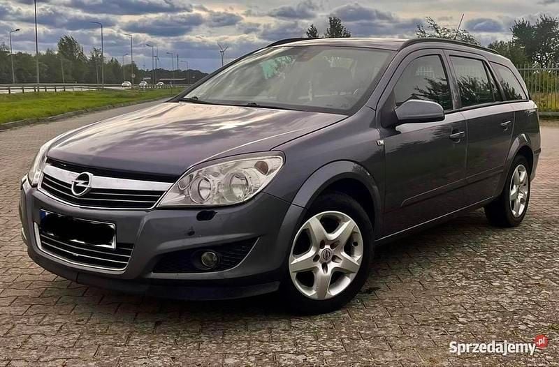 Szary Używany 2007 Opel Astra Kombi | 8499 zł (Uczciwa cena) - Obraz 1/4