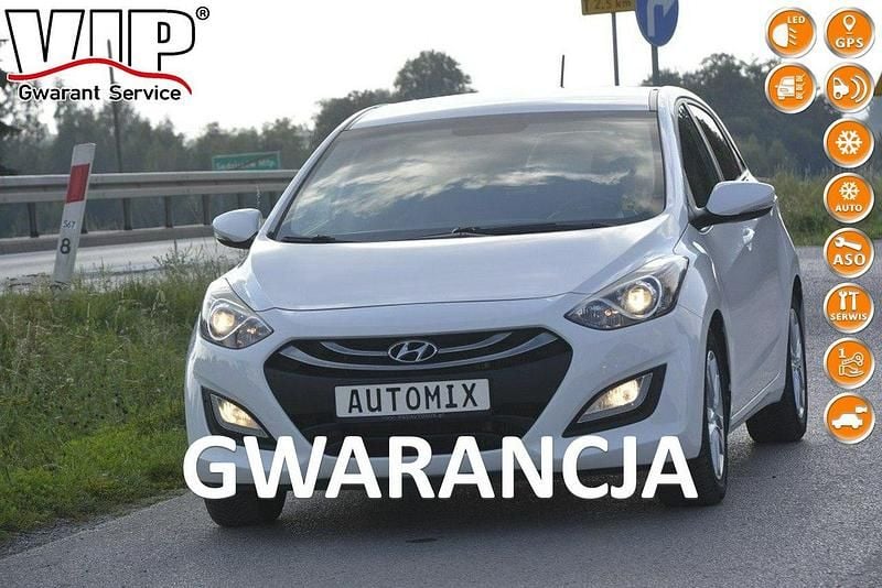 Biały Używany 2014 Hyundai i30 Hatchback | 33 300 zł (Uczciwa cena) - Obraz 1/4