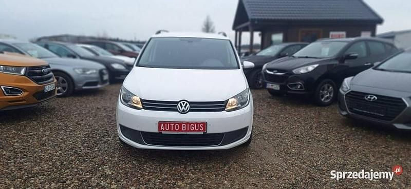 Biały Używany 2012 VW Touran Minivan | 28 900 zł (Uczciwa cena) - Obraz 1/4