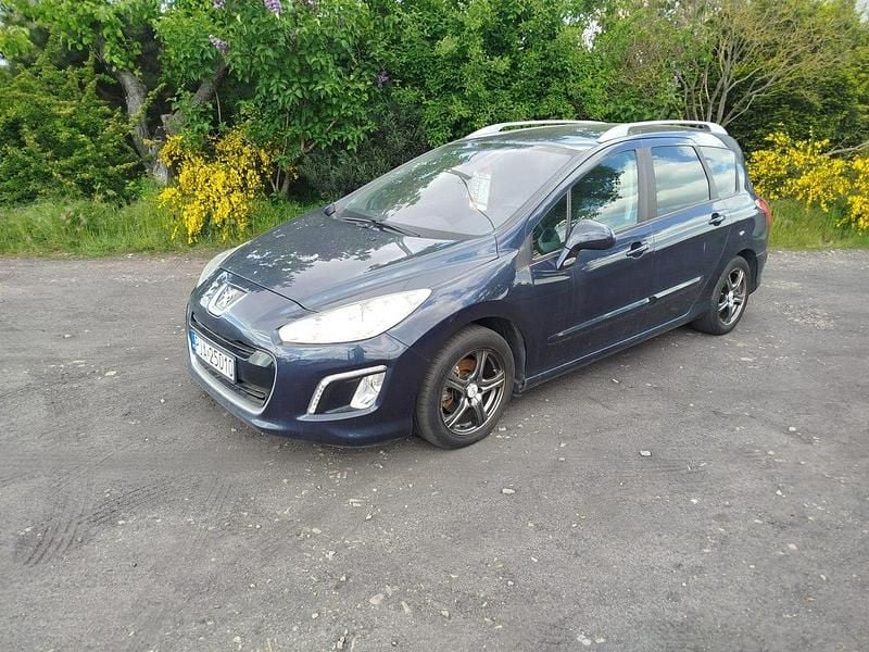 Używany Peugeot 308 SW 112 KM (82 kW) 2011 Niebieski Kombi