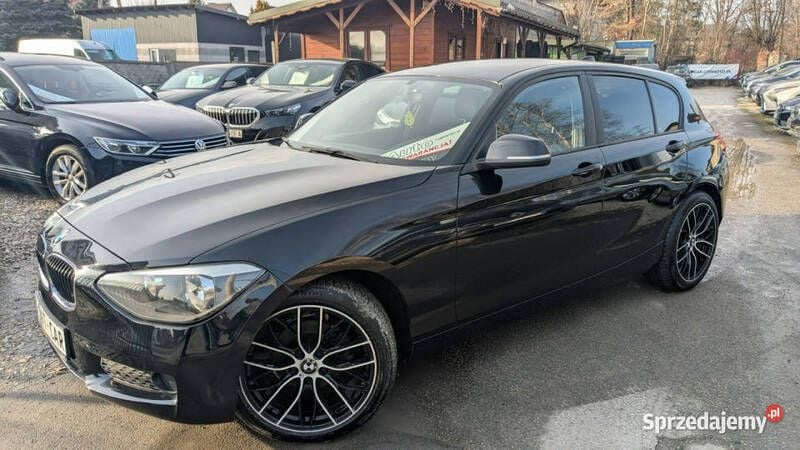 Czarny (metalik) Używany 2012 BMW 116 Comfort Edition Hatchback | 26 900 zł (Dobra cena) - Obraz 1/4