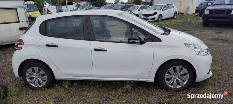 Biały Używany 2013 Peugeot 208 Active Hatchback | 13 900 zł (Dobra cena) - Obraz 1/4