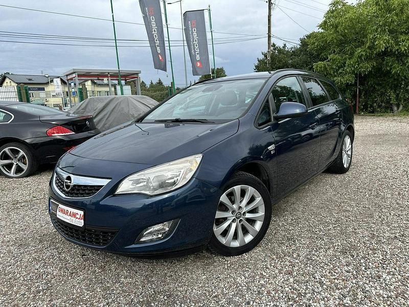 Niebieski Używany 2012 Opel Astra Kombi | 23 900 zł (Uczciwa cena) - Obraz 1/4