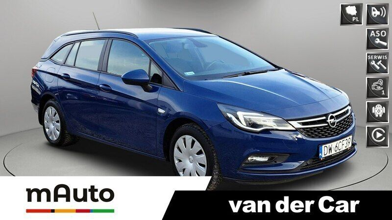 Niebieski Używany 2018 Opel Astra Enjoy Kombi | 40 900 zł (Uczciwa cena) - Obraz 1/4