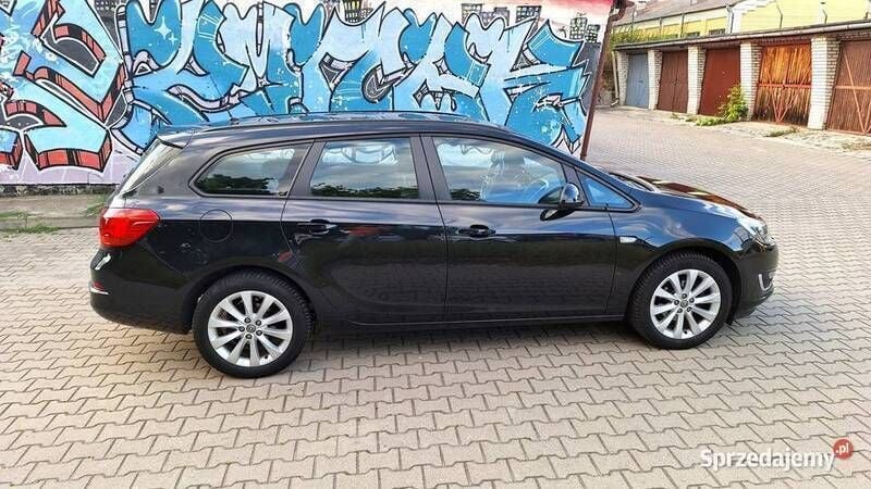 Czarny Używany 2013 Opel Astra Active Kombi | 22 900 zł (Dobra cena) - Obraz 1/4