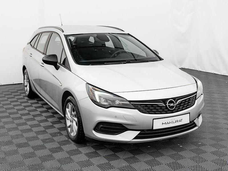 Używany Opel Astra 130 KM (95 kW) 2021 Srebrny (metalik) Kombi