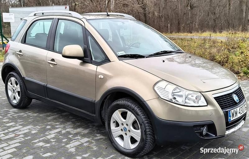 Złoty Używany 2007 Fiat Sedici SUV | 14 900 zł (Uczciwa cena) - Obraz 1/4