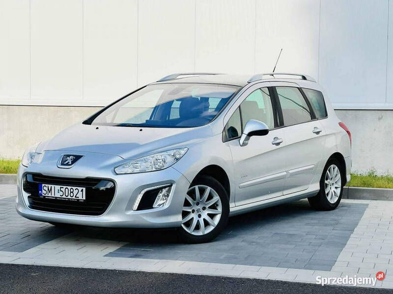 Srebrny (metalik) Używany 2014 Peugeot 308 Kombi | 19 900 zł - Obraz 1/4