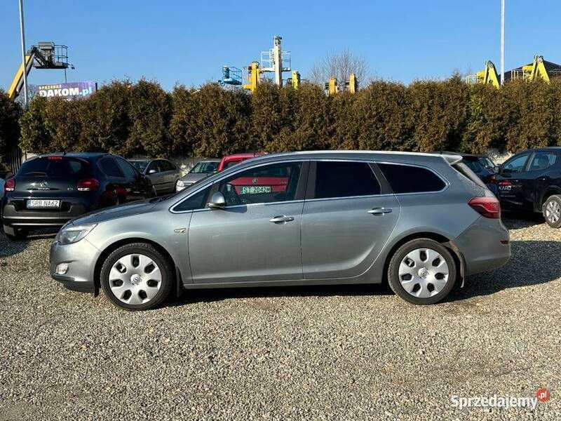 Szary Używany 2012 Opel Astra Kombi | 14 490 zł (Uczciwa cena) - Obraz 1/4