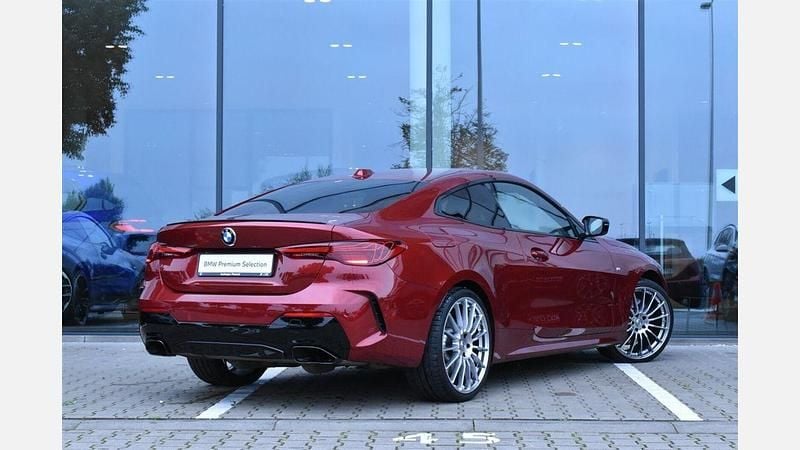 Używany BMW M440 Comfort Edition 340 KM (250 kW) 2024 Czerwony fire red metalizowany Sedan/Limuzyna
