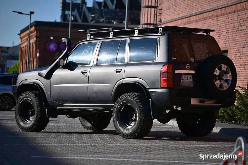 Zielony Używany 2009 Nissan Patrol SUV | 89 500 zł - Obraz 1/4