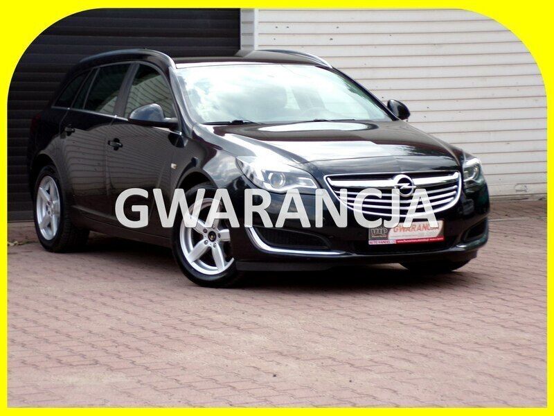 Czarny Używany 2014 Opel Insignia Kombi | 28 900 zł (Uczciwa cena) - Obraz 1/4