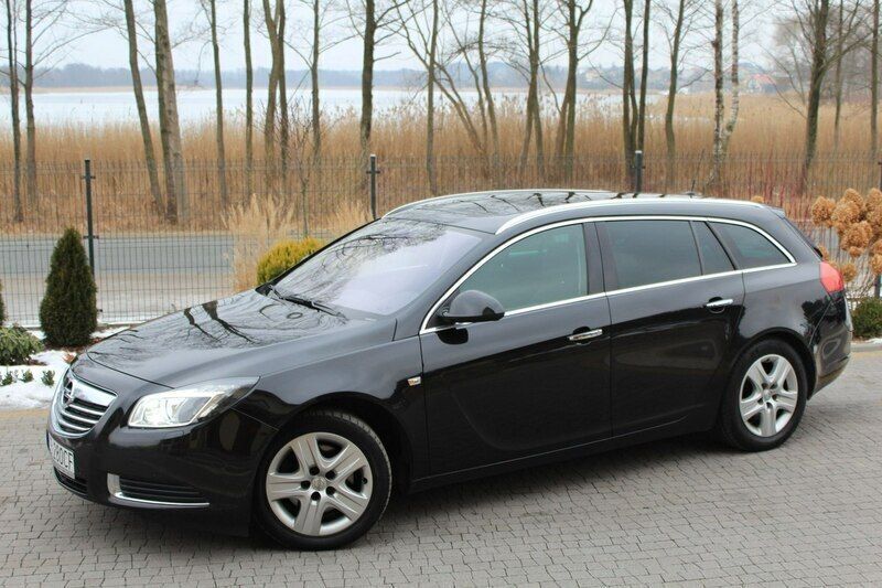 Czarny metalik perłowy (metallic) Używany 2010 Opel Insignia Cosmo Sedan/Limuzyna | 34 900 zł - Obraz 1/4