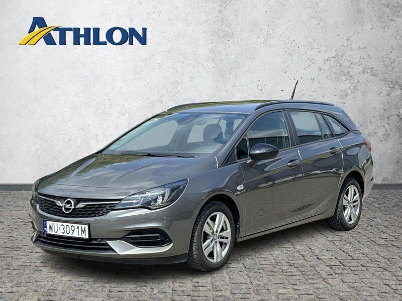 Szary (metalik) Używany 2021 Opel Astra Kombi | 58 800 zł (Uczciwa cena) - Obraz 1/4