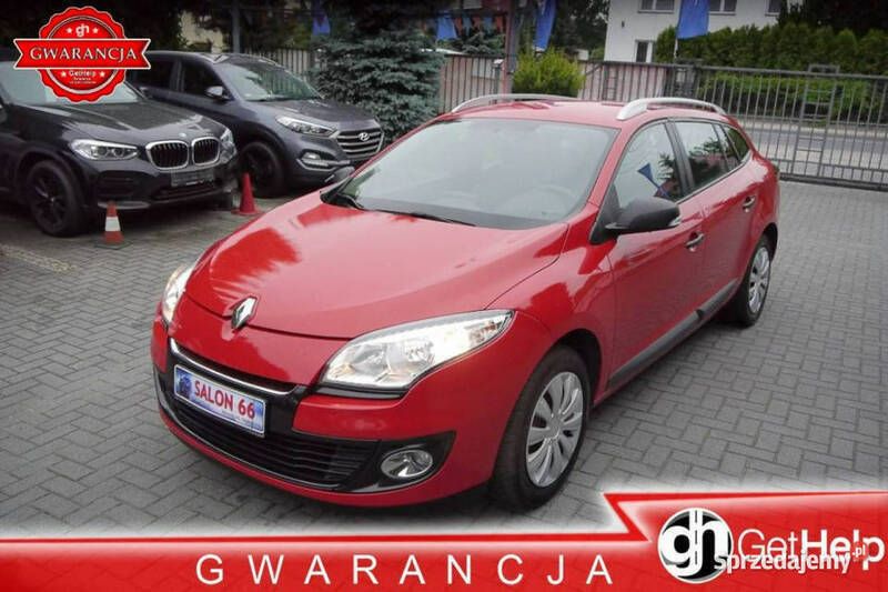 Czerwony (metalik) Używany 2013 Renault Mégane GrandTour Kombi | 24 800 zł - Obraz 1/4