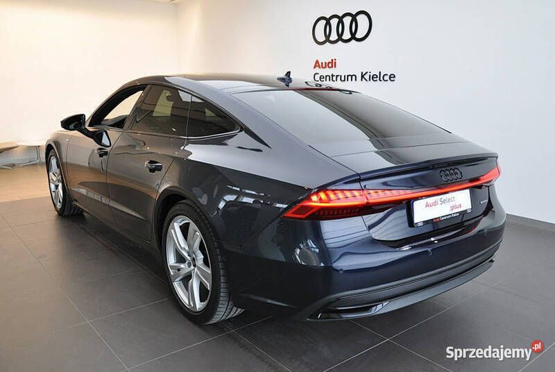 Granatowy Używany 2023 Audi A7 Ambiente Hatchback | 309 980 zł (Dość drogi) - Obraz 1/4