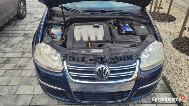 Granatowy Używany 2009 VW Golf VI Kombi | 14 900 zł (Uczciwa cena) - Obraz 1/4