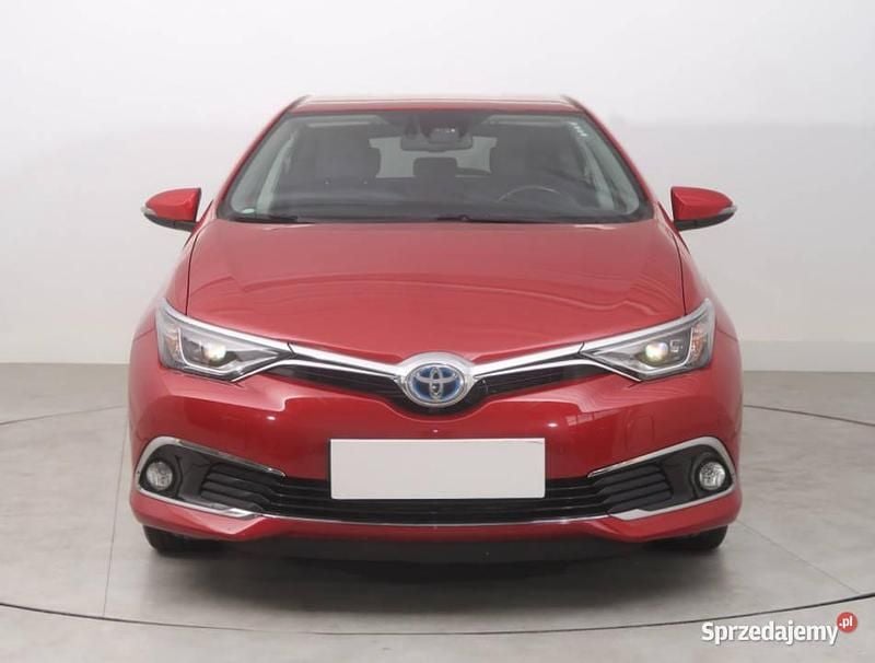 Bordowy Używany 2016 Toyota Auris Hybrid Hatchback | 59 999 zł (Uczciwa cena) - Obraz 1/4