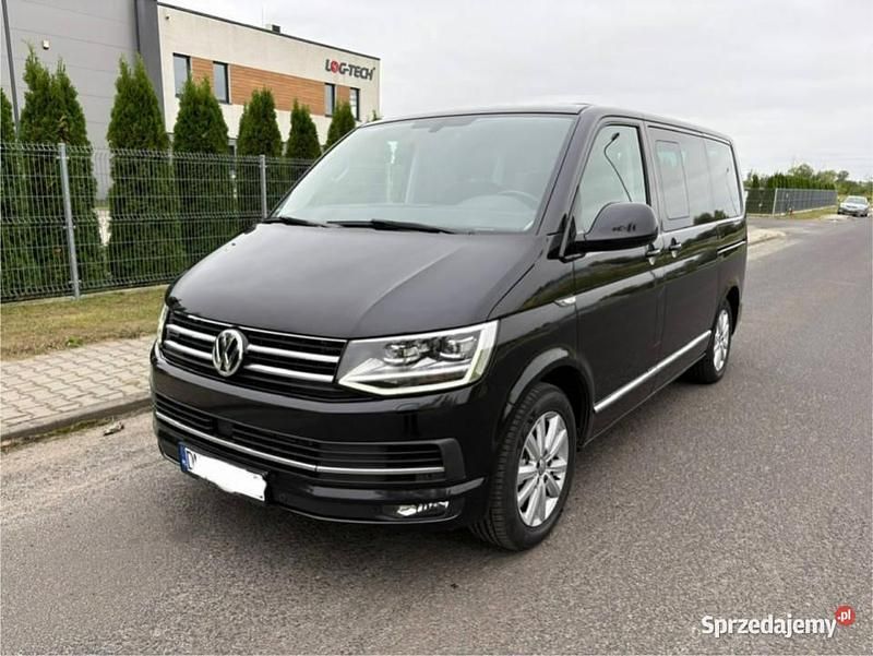 Czarny (metalik, perła) Używany 2018 VW Multivan Highline Van | 130 000 zł (Super Cena) - Obraz 1/4