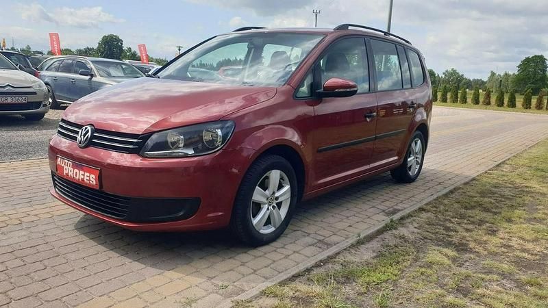Używany VW Touran 105 KM (77 kW) 2010 Bordowy (metalik) Minivan