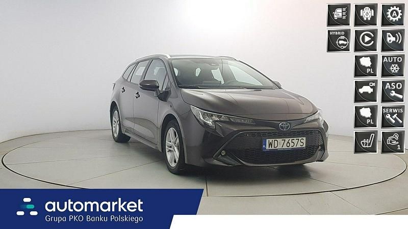 Brązowy Używany 2022 Toyota Corolla Comfort Kombi | 91 850 zł - Obraz 1/4