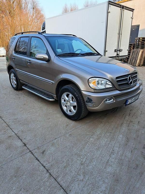Żółtozłoty Używany 2004 Mercedes ML500 SUV | 19 000 zł - Obraz 1/4