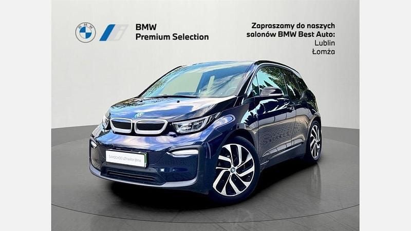 Niebieski cesarski z akcentem w kolorze frozen grey metalizowany Używany 2021 BMW i3 Comfort Edition Hatchback | 75 900 zł - Obraz 1/3