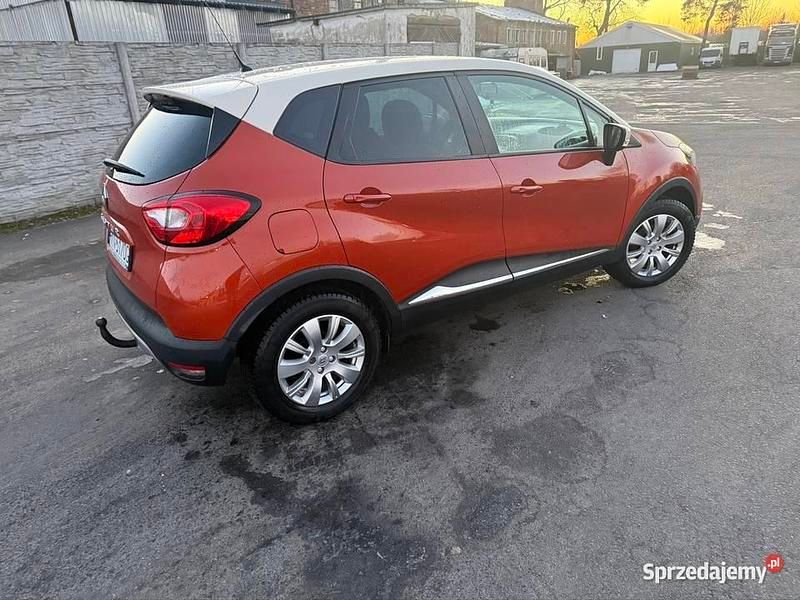 Używany Renault Captur 90 KM (66 kW) 2014 Pomarańczowy SUV